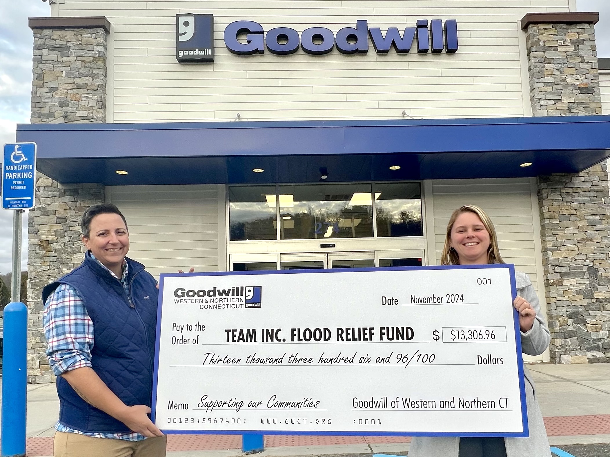 Goodwill Check Presentation to Team Inc.jpg